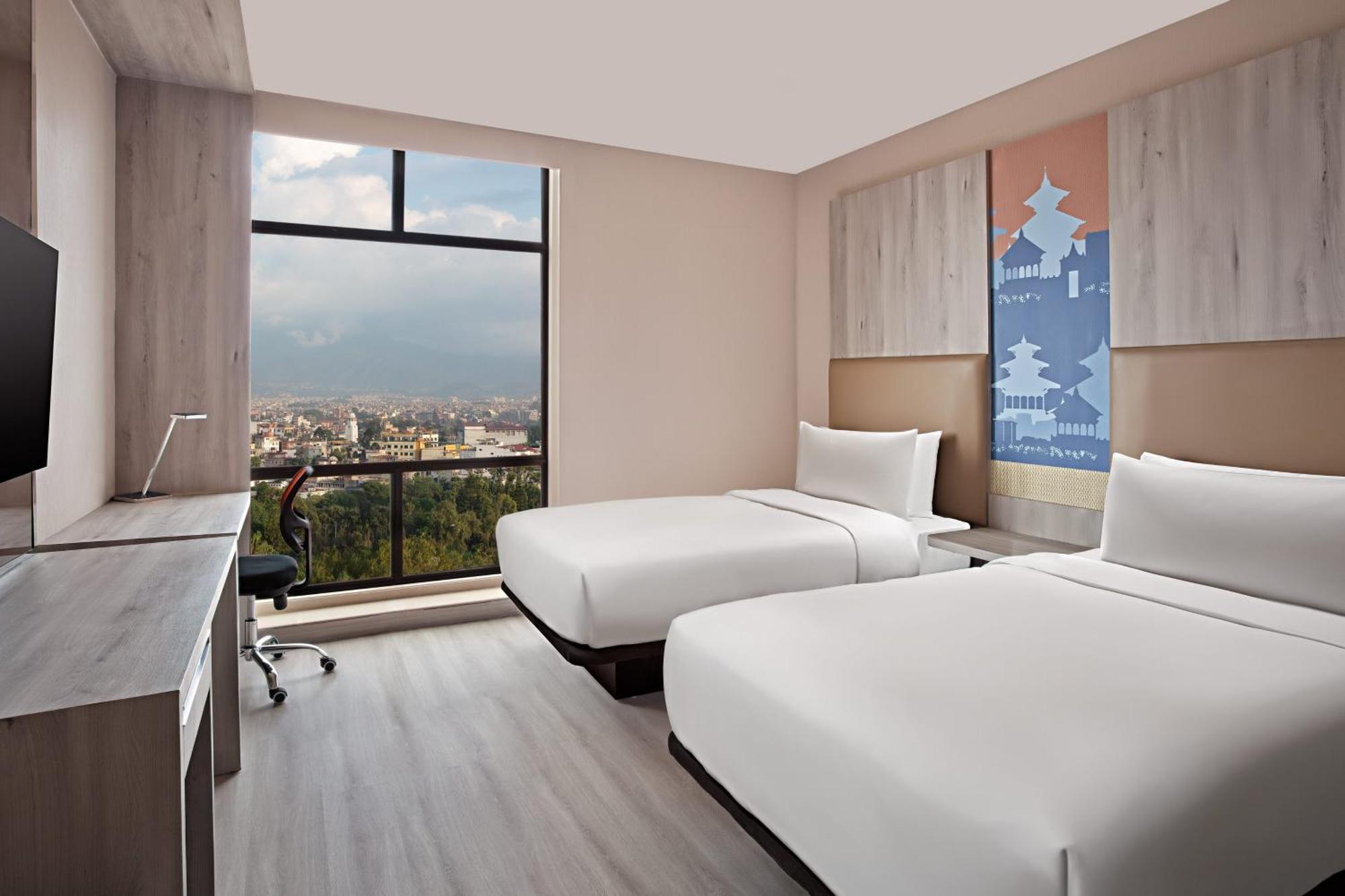 Aloft Thamel Hotel
